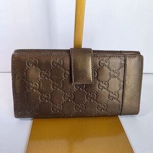 Gucci Embossed Brown Leather Wallet